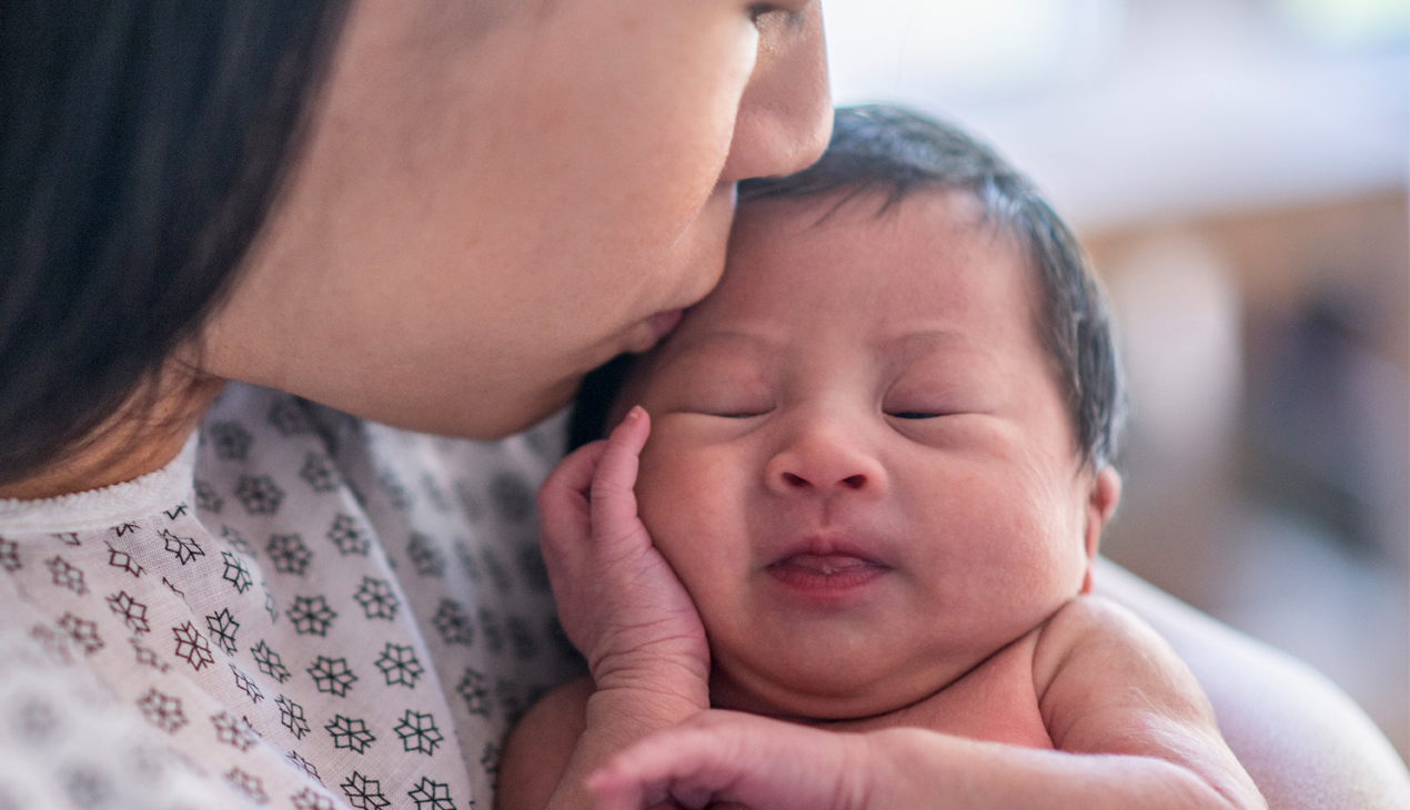 Mother holding newborn